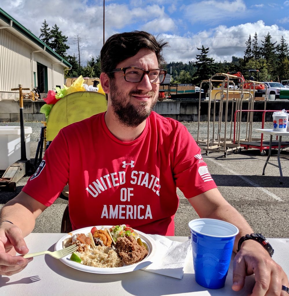 Jesse with a plate of Mexican Street Tacos